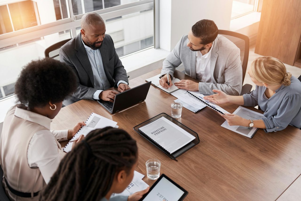 Professionals collaborating in a meeting